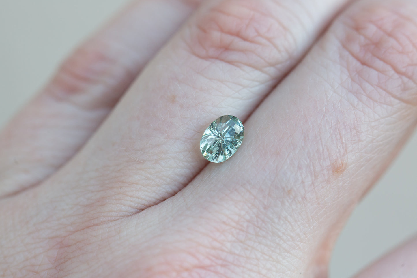 Load image into Gallery viewer, 1.41ct oval seafoam mint green sapphire- Starbrite cut by John Dyer

