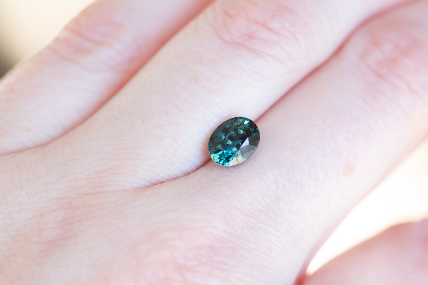 1.98ct oval deep blue green sapphire