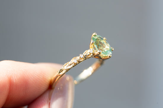 Rowan setting with oval lab green sapphire