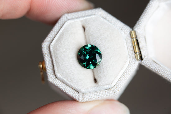 2.38ct round deep green sapphire