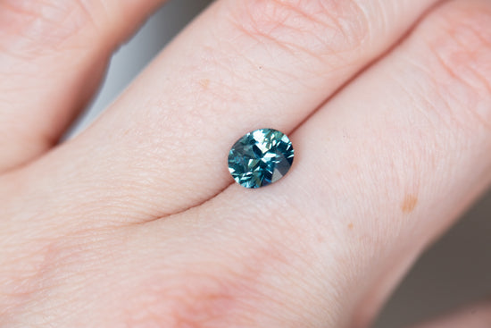 1.7ct blue teal oval sapphire