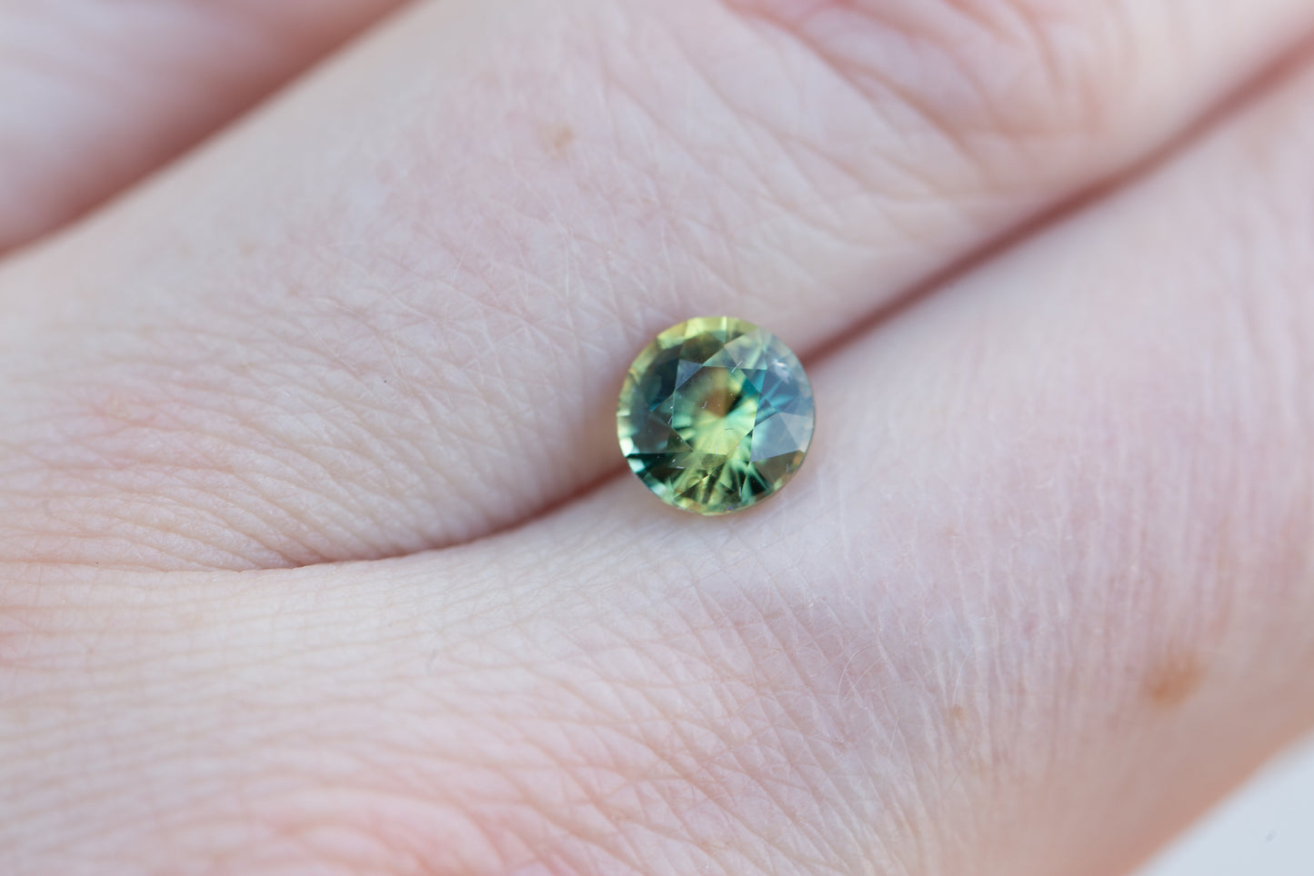 1.32ct round green yellow sapphire
