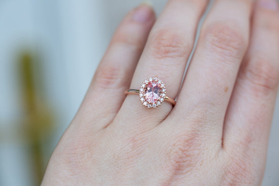 Load image into Gallery viewer, Oval lab peach sapphire halo ring
