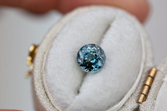 1.75ct round teal blue sapphire