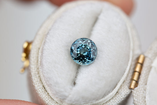 1.75ct round teal blue sapphire