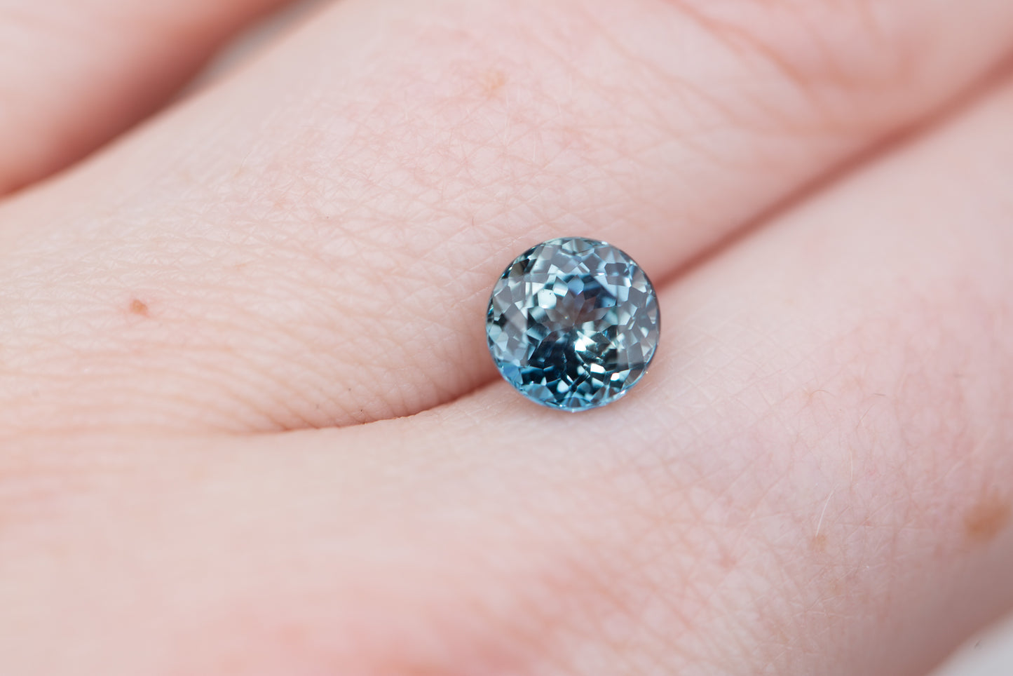1.75ct round teal blue sapphire