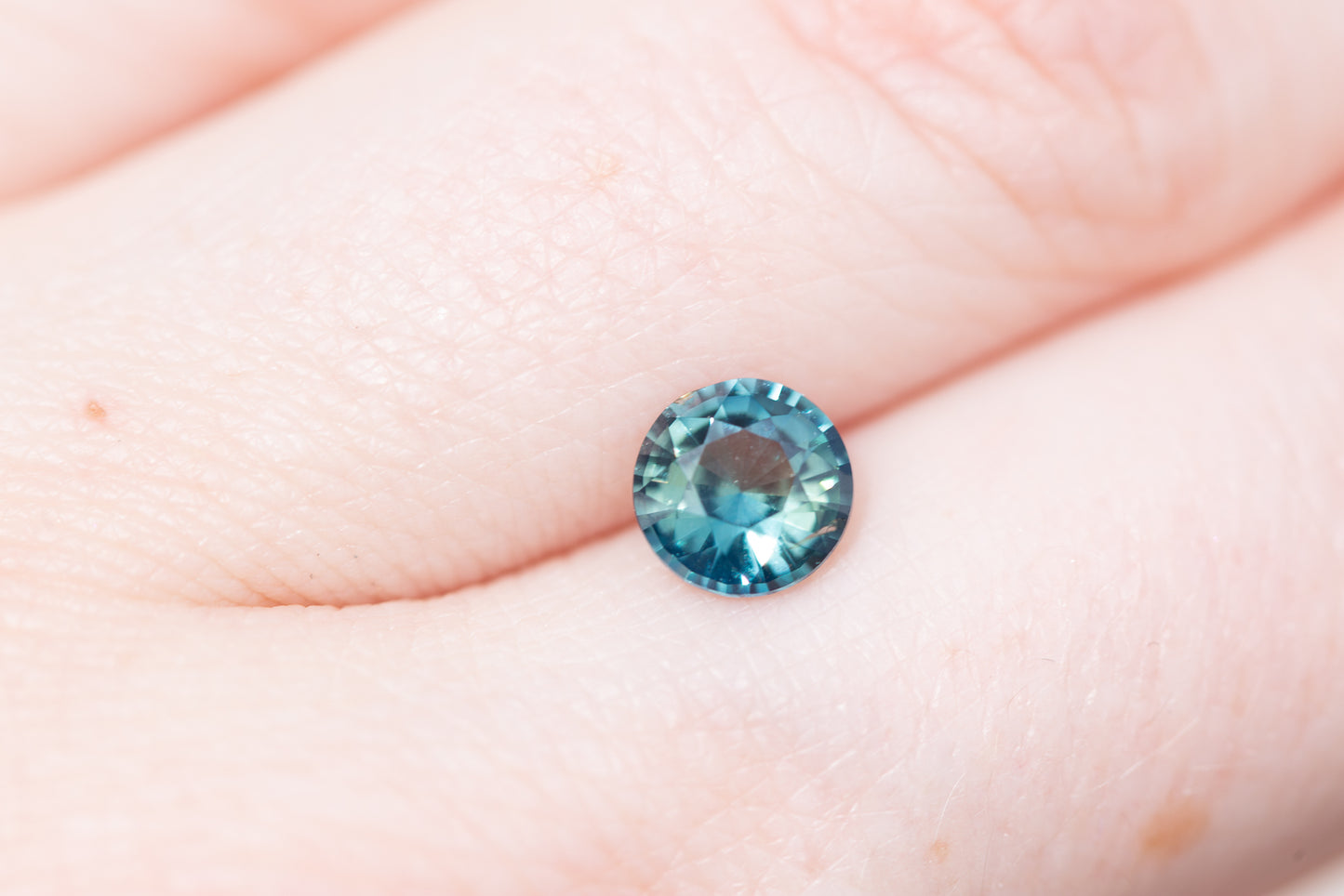 1.24ct round teal blue green sapphire