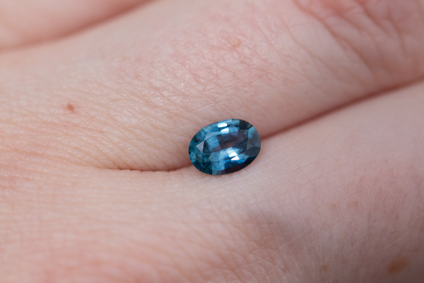 .84ct oval blue teal sapphire