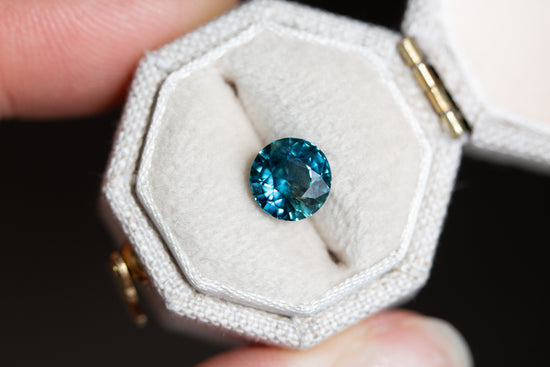 1.97ct round teal blue sapphire