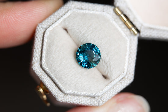 1.97ct round teal blue sapphire