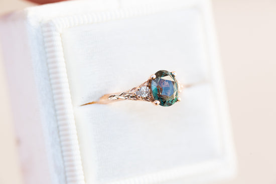 The Aspen with oval green sapphire