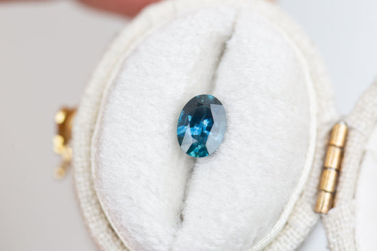 .84ct oval darker blue with hint of teal sapphire