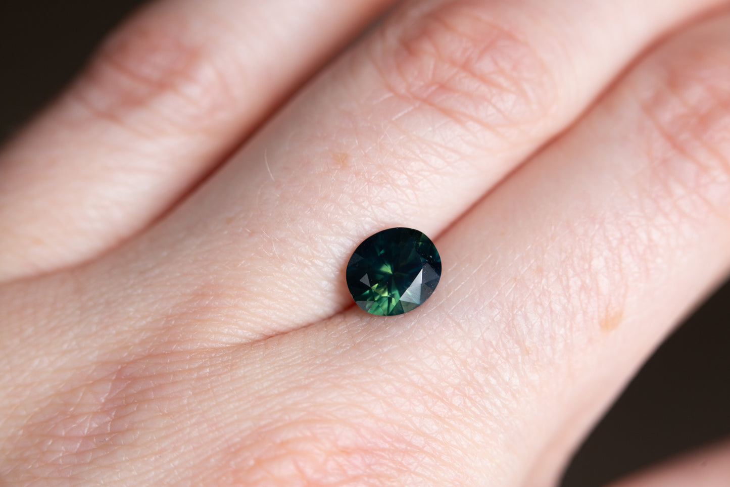 1.97ct deep blue green sapphire