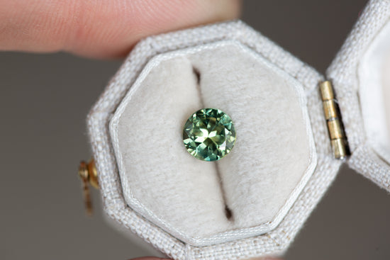 Load image into Gallery viewer, 1.35ct round green sapphire
