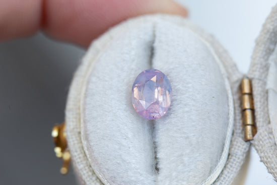 1.57ct oval opalescent pinky lavender sapphire