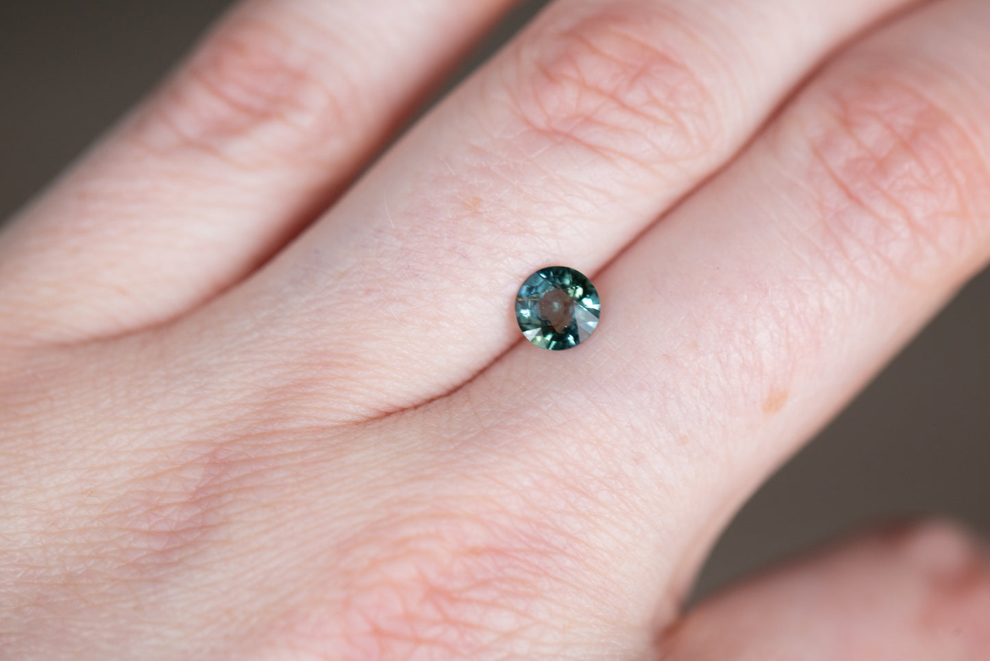 Load image into Gallery viewer, .88ct round blue green sapphire
