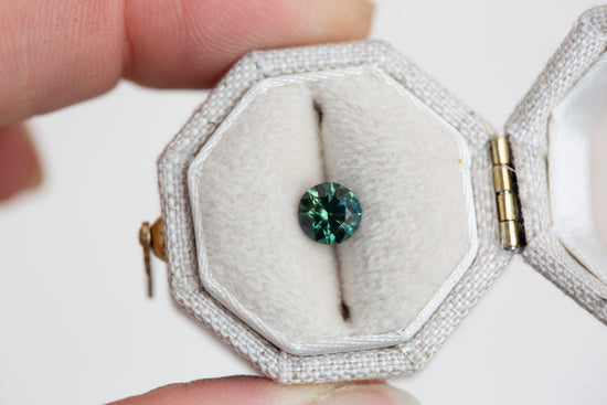 .76ct round blue green sapphire