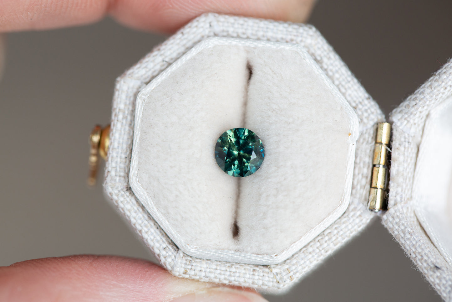.76ct round blue green sapphire