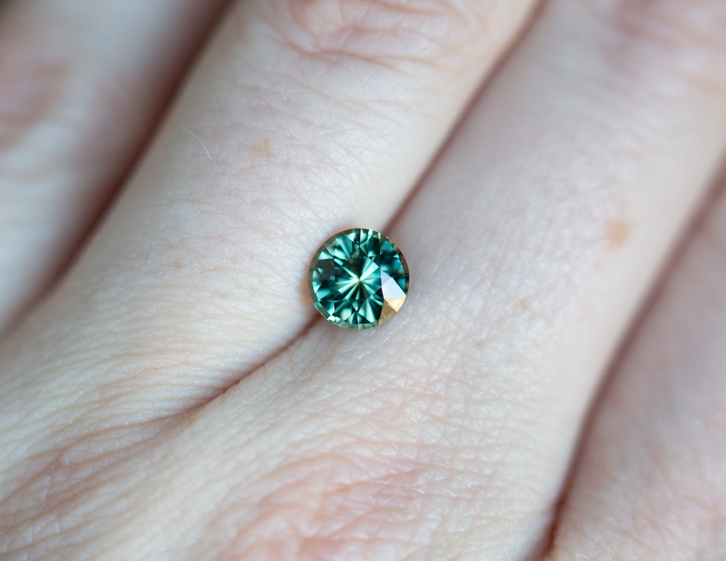 1.39ct round green teal sapphire