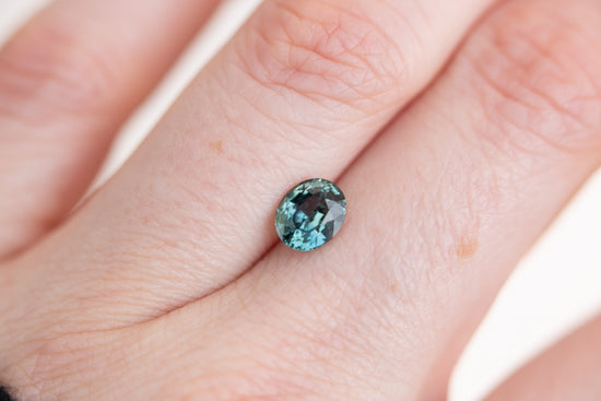 Load image into Gallery viewer, 1.34ct oval blue green sapphire
