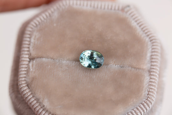 Load image into Gallery viewer, 1.06ct oval teal sapphire
