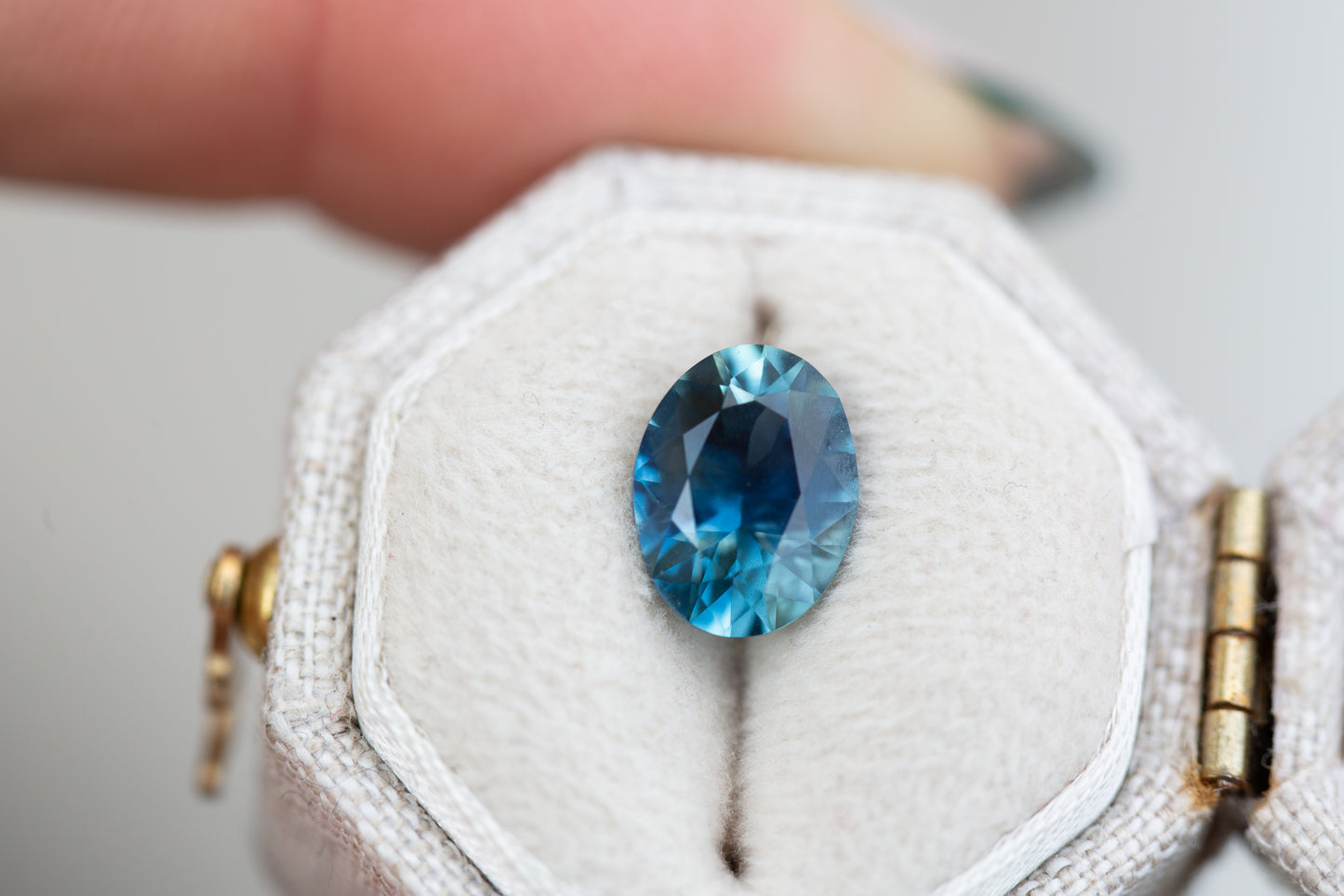 2.4ct oval deep blue teal sapphire