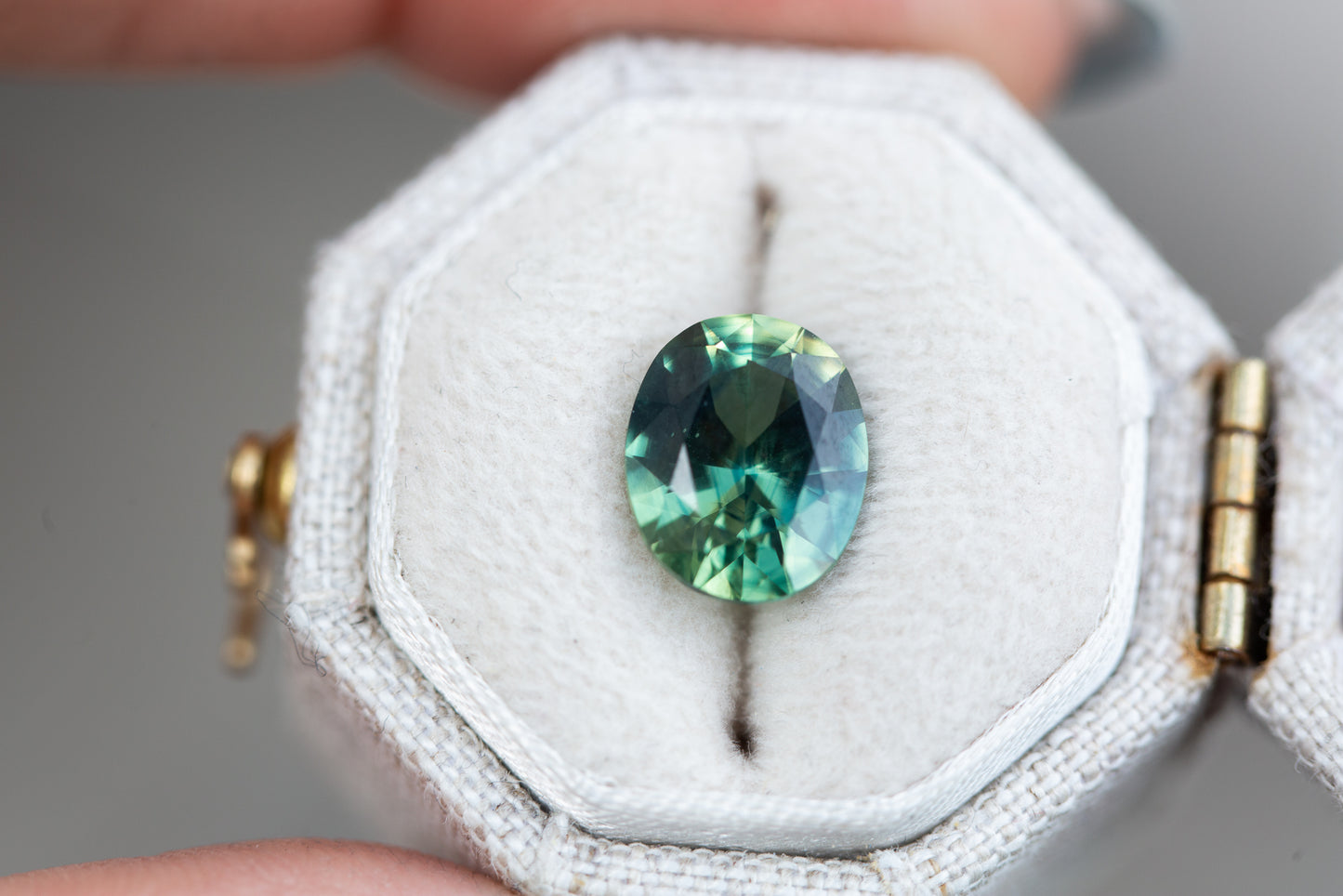 3.05ct oval parti teal green sapphire