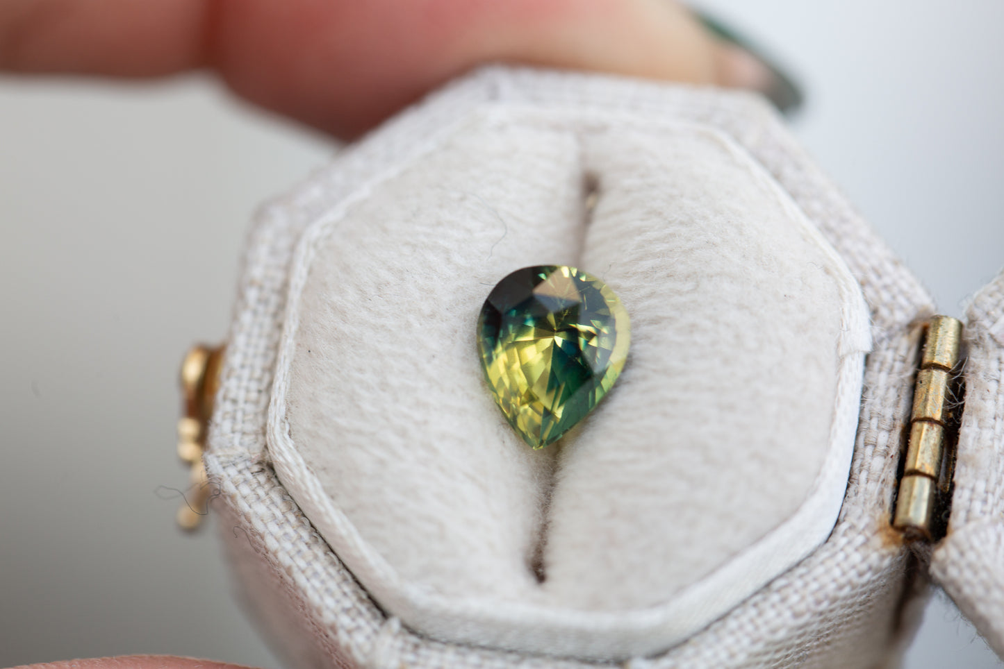 1.89ct pear yellow green parti sapphire