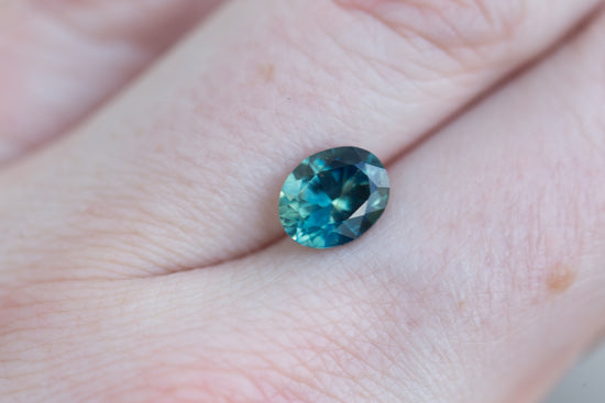 Load image into Gallery viewer, 2.29ct oval deep teal blue sapphire
