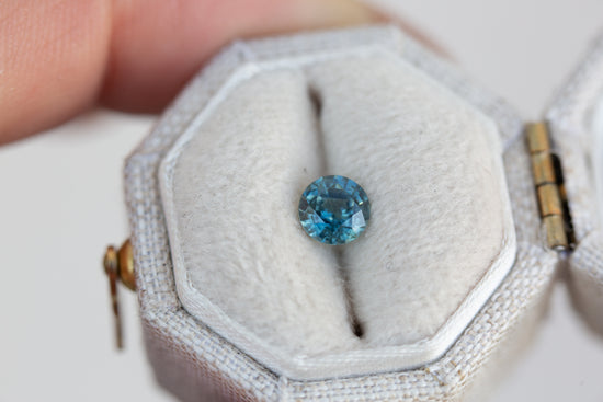 .68ct round blue green sapphire