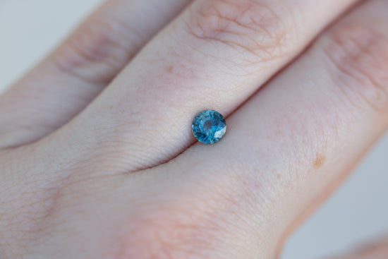 .68ct round blue green sapphire