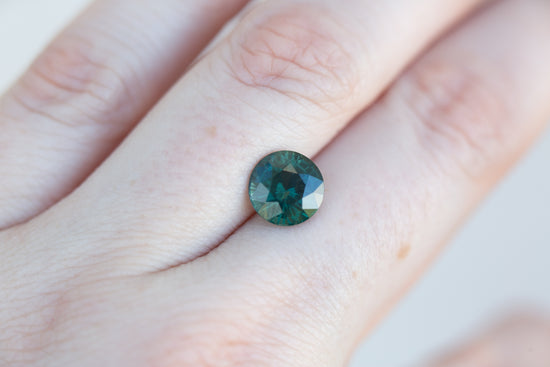 3.24ct round deep green sapphire