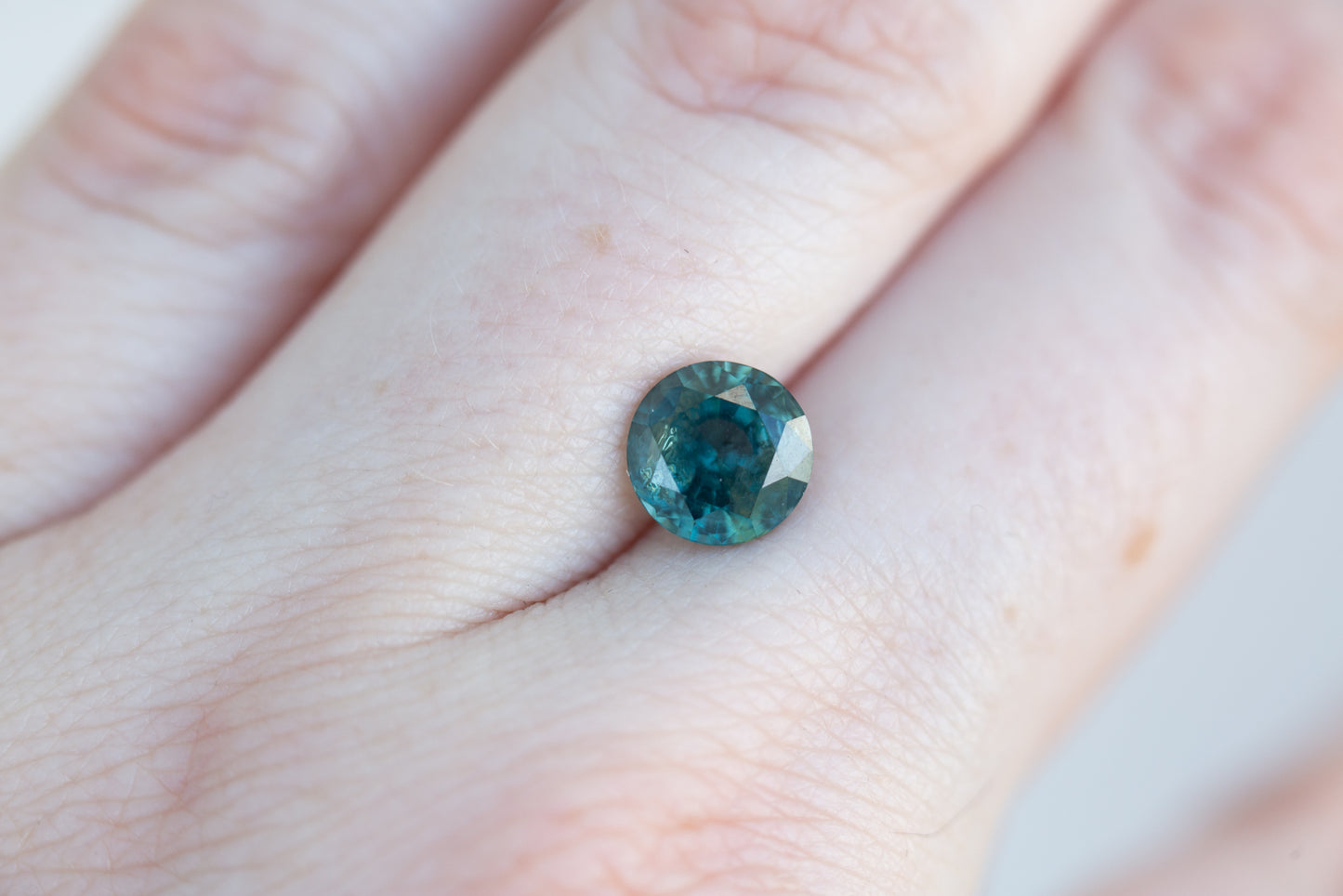 2.32ct round teal green blue sapphire