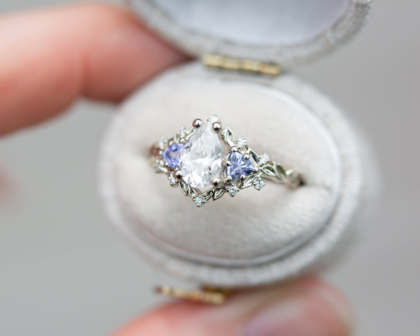Load image into Gallery viewer, Briar rose three stone with pear moissanite and tanzanite
