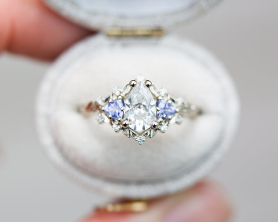 Load image into Gallery viewer, Briar rose three stone with pear moissanite and tanzanite
