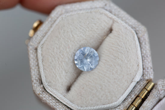 .86ct round opalescent light blue sapphire