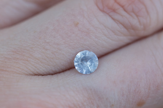 .86ct round opalescent light blue sapphire