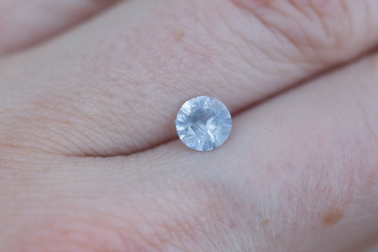 .86ct round opalescent light blue sapphire