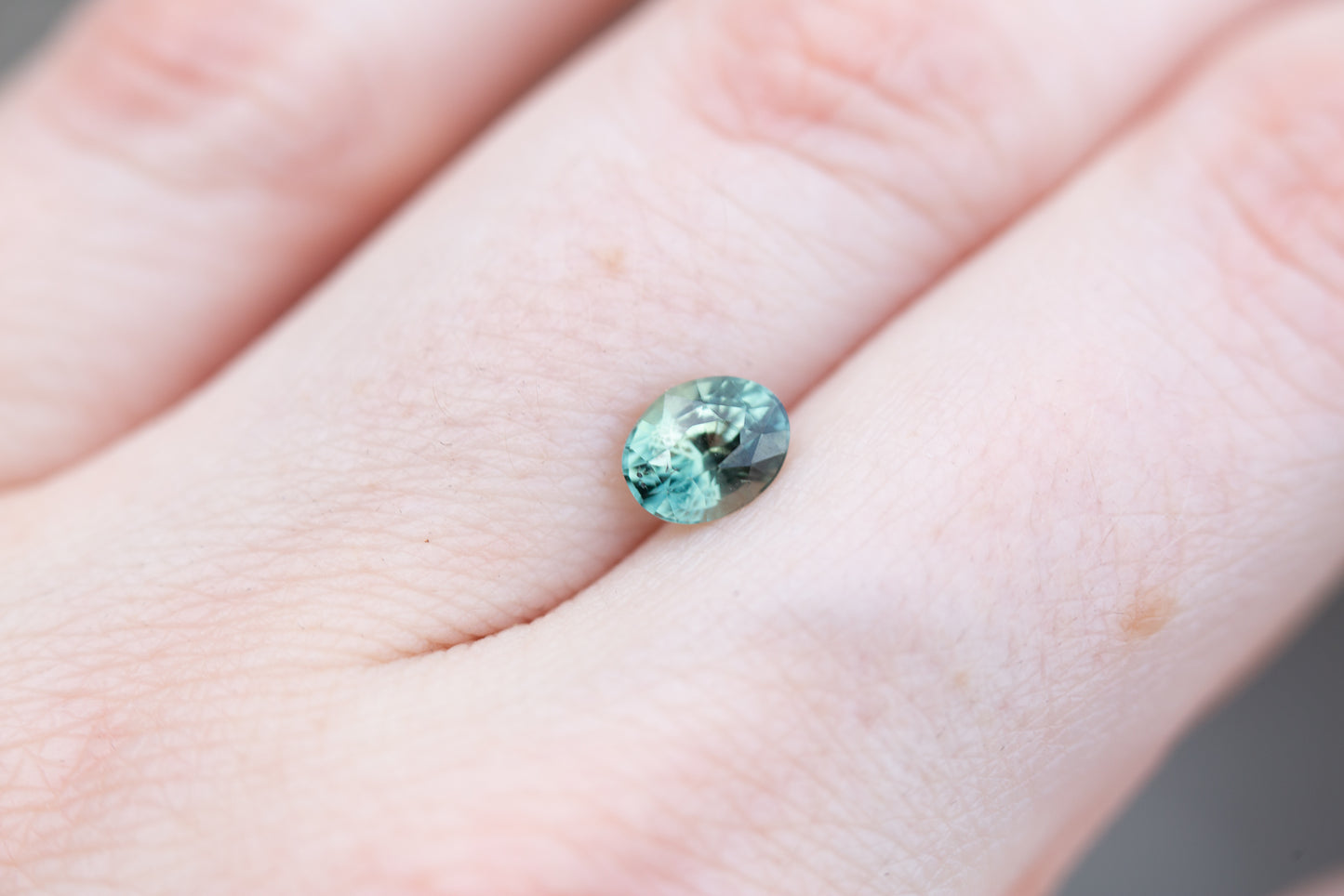 1.09ct oval teal sapphire