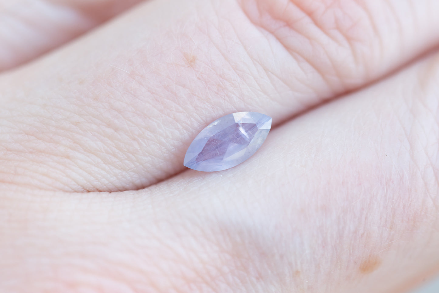 Load image into Gallery viewer, .9ct marquise opaque lavender sapphire
