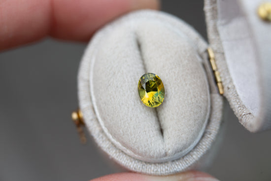 1.13ct oval yellow green sapphire