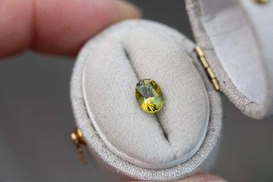 1.13ct oval yellow green sapphire