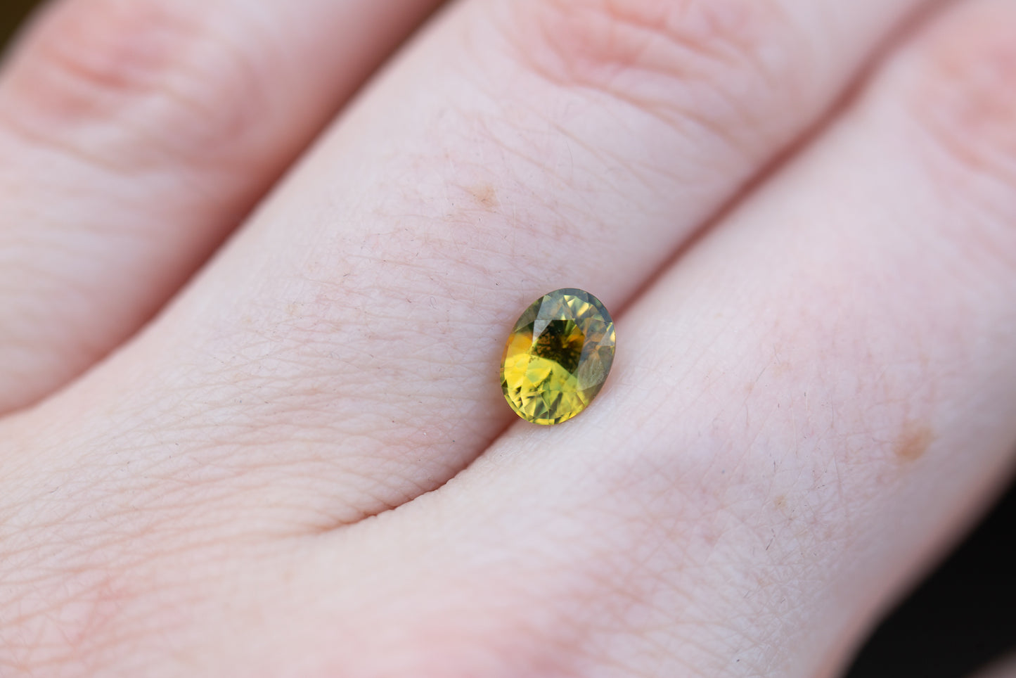 1.13ct oval yellow green sapphire