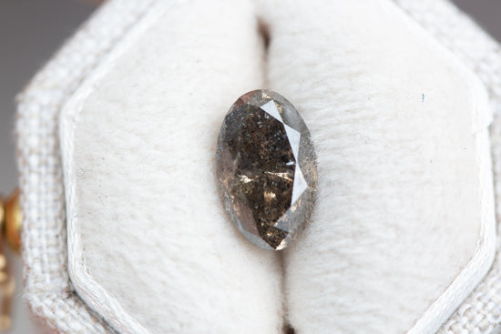 1.56ct oval grey/brown salt and pepper diamond