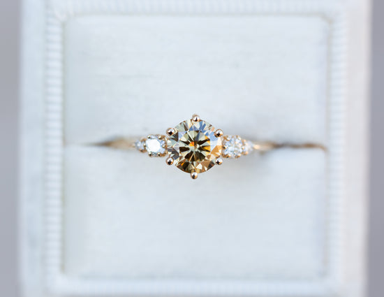 Round champagne moissanite five stone ring