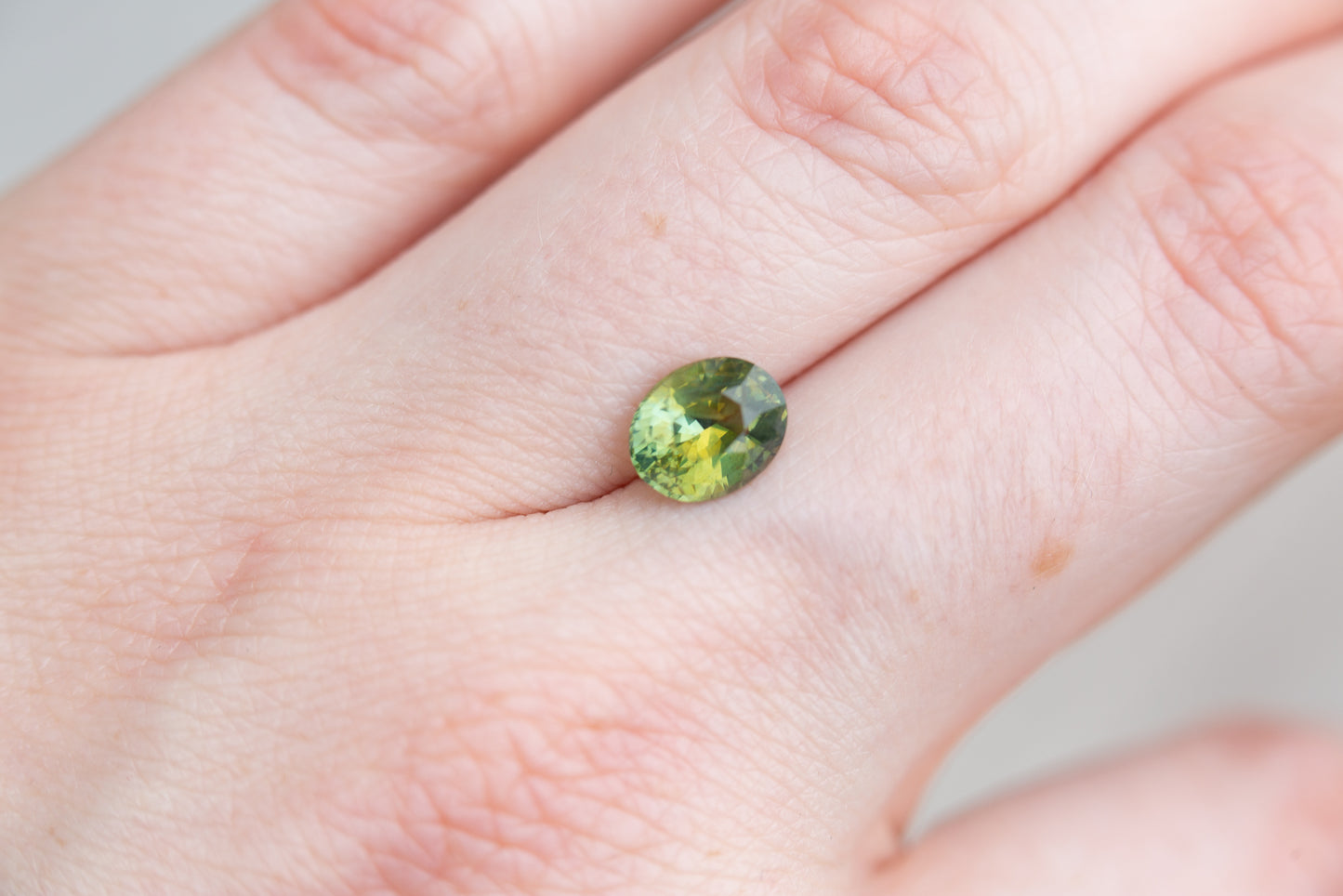 2.06ct oval green yellow sapphire