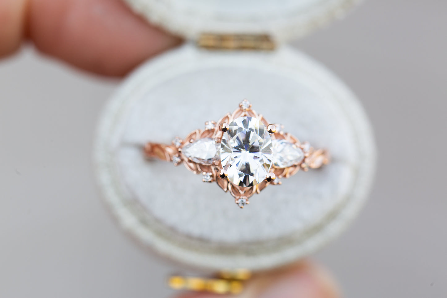 Load image into Gallery viewer, Briar rose three stone with oval moissanite and pear side stones
