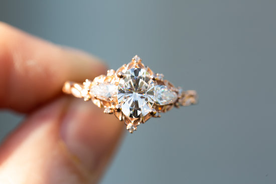 Load image into Gallery viewer, Briar rose three stone with oval moissanite and pear side stones

