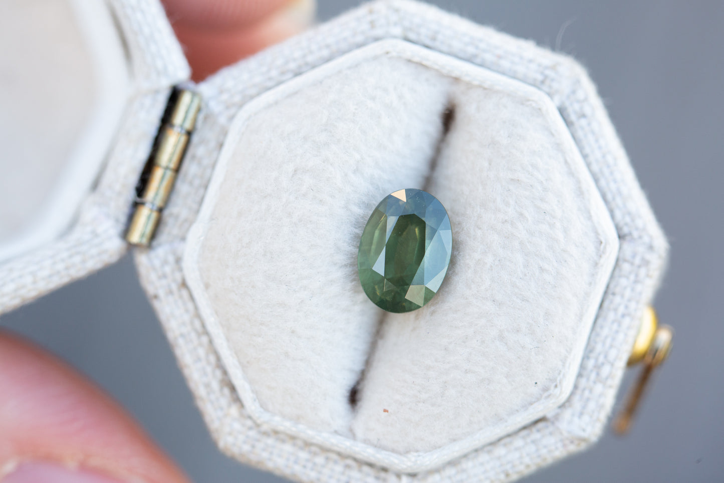 1.45ct oval olive green sapphire