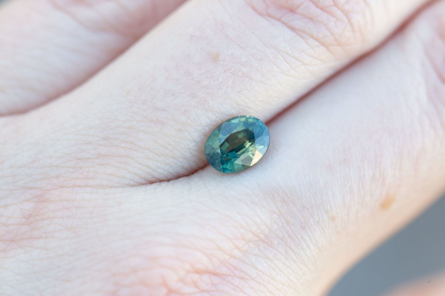 1.7ct oval teal green sapphire